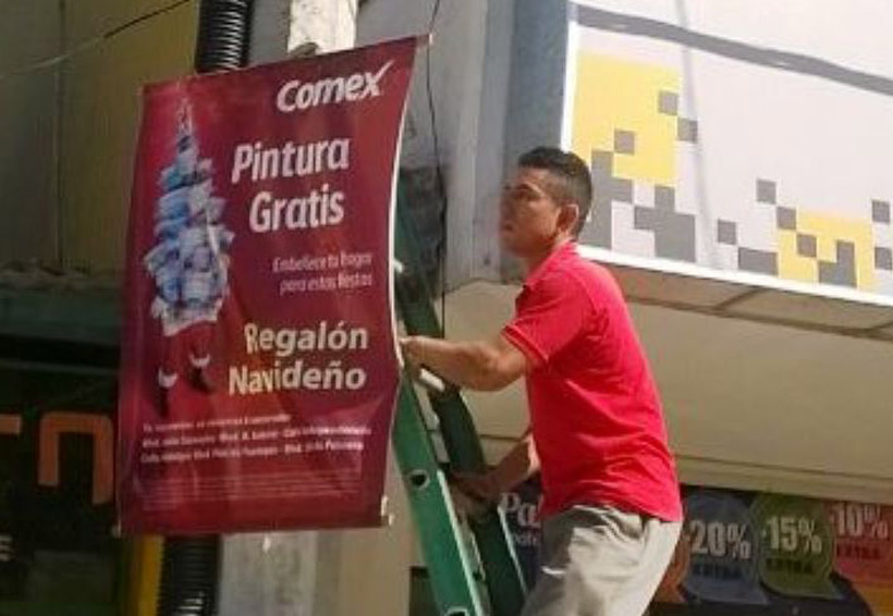 Desconocen comerciantes ley de pago para publicitarse en la Cuenca
