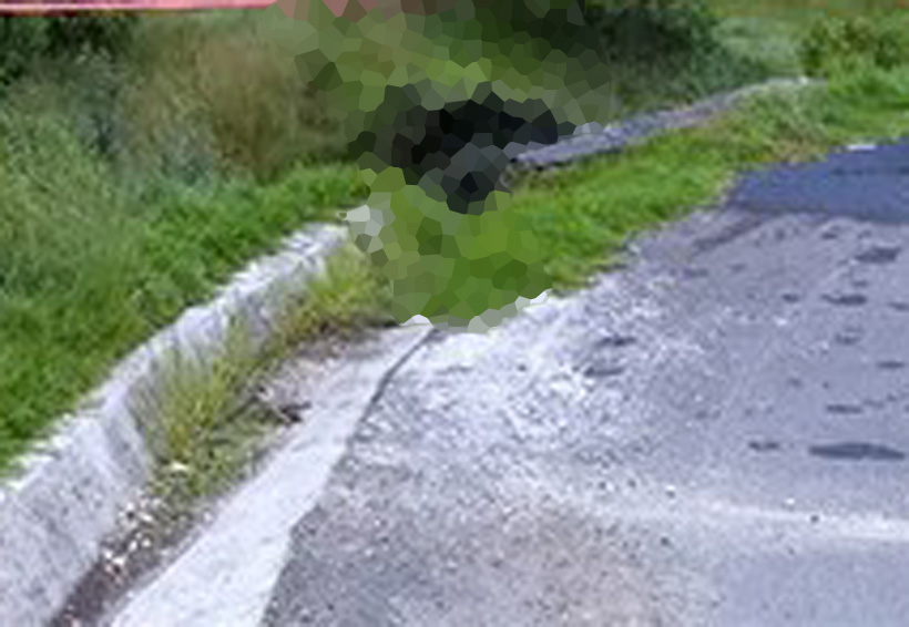 Asesinan y queman a dos cuerpos desnudos a un lado de la carretera