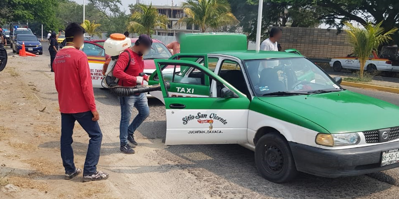 Sanitizan vehículos del servicio público en El Espinal | El Imparcial de Oaxaca