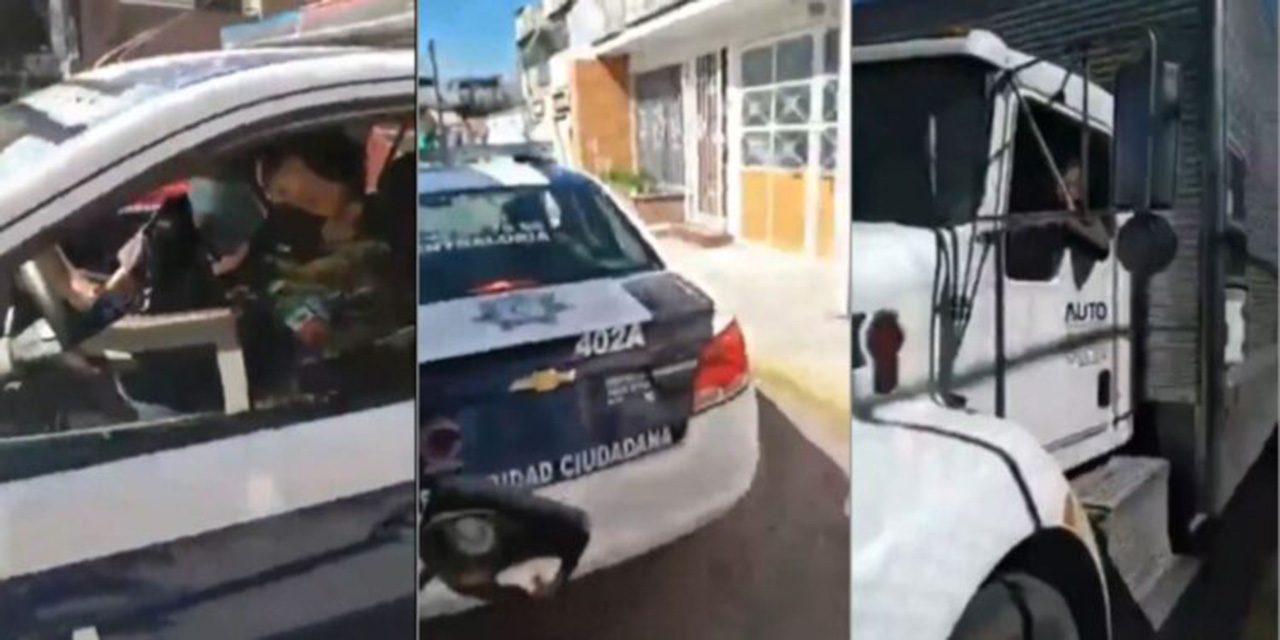Video: Ciudadanos persiguen a policías que robaron celular a chofer de tráiler | El Imparcial de Oaxaca