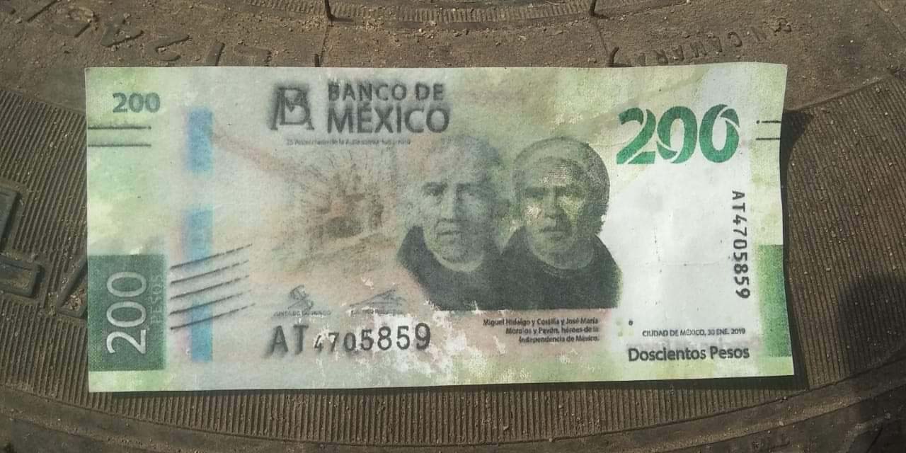 Timan a comerciante con billete falso
