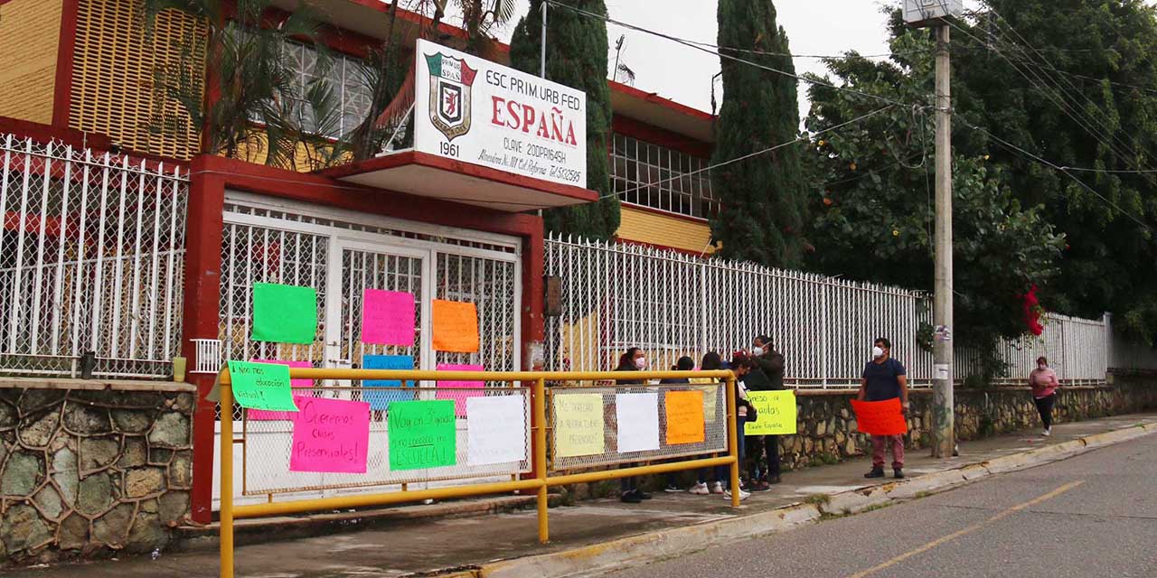 Con tequio adecuan escuela España para clases presenciales | El Imparcial de Oaxaca