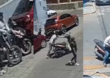 ¡Robo descarado en el centro de Oaxaca! Pareja es captada atracando una moto