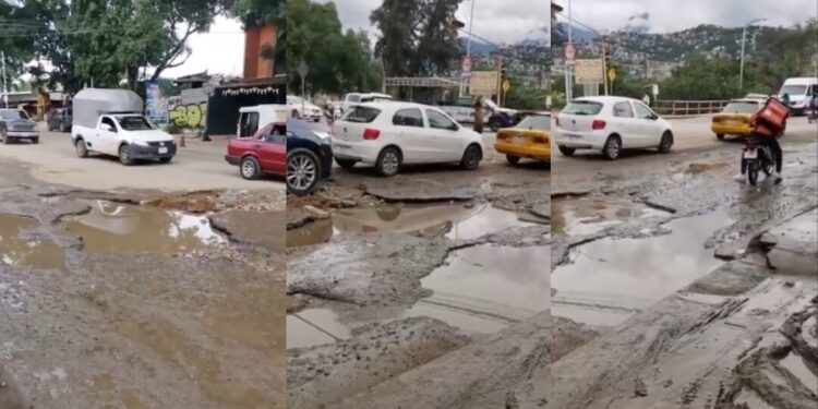 ¡Vergüenza vial! Vecinos denuncian abandono total en avenida Monte Albán; entre baches, agua y caos