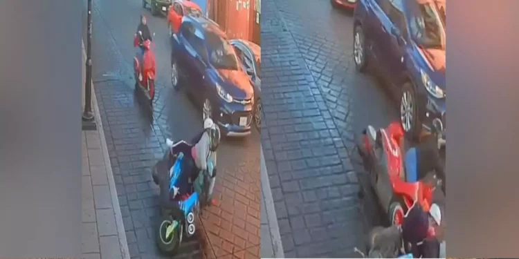 VIDEO | Motos derrapan por diésel y casi provoca tragedia con niños a bordo