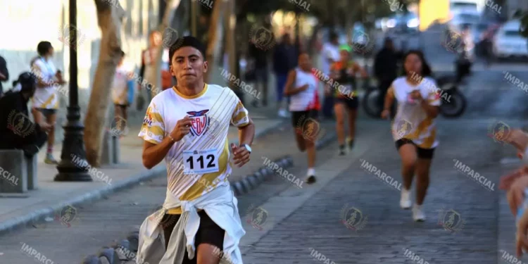 Fotos: Leobardo García Reyes // La carrera, de 5 y 10 kilómetros.