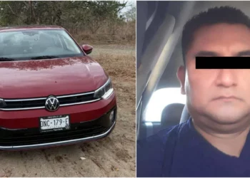 El automóvil Volkswagen Virtus color guinda con placas de Chiapas. La víctima presentaba disparos en la cabeza.