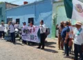 Foto: redes sociales // Protesta de jubilados de la CFE durante la calenda por celebración de 89 años de la CFE.